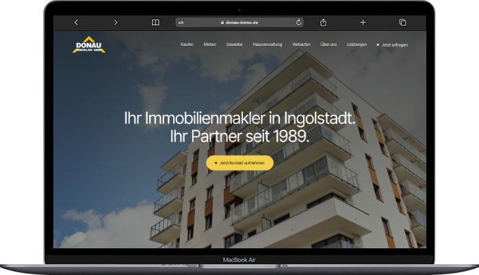 Website Donau Immobilien Ingolstadt auf einem MacBook Air, umgesetzt von der MF Marketing GmbH